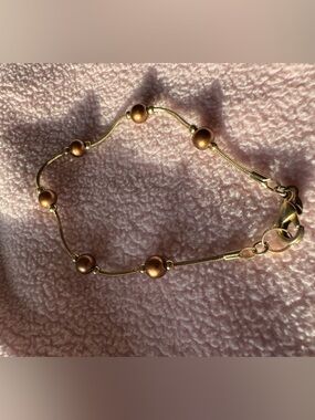Gold-Tone Beaded Women's Bracelet - Elegant Metallic Brown Beads